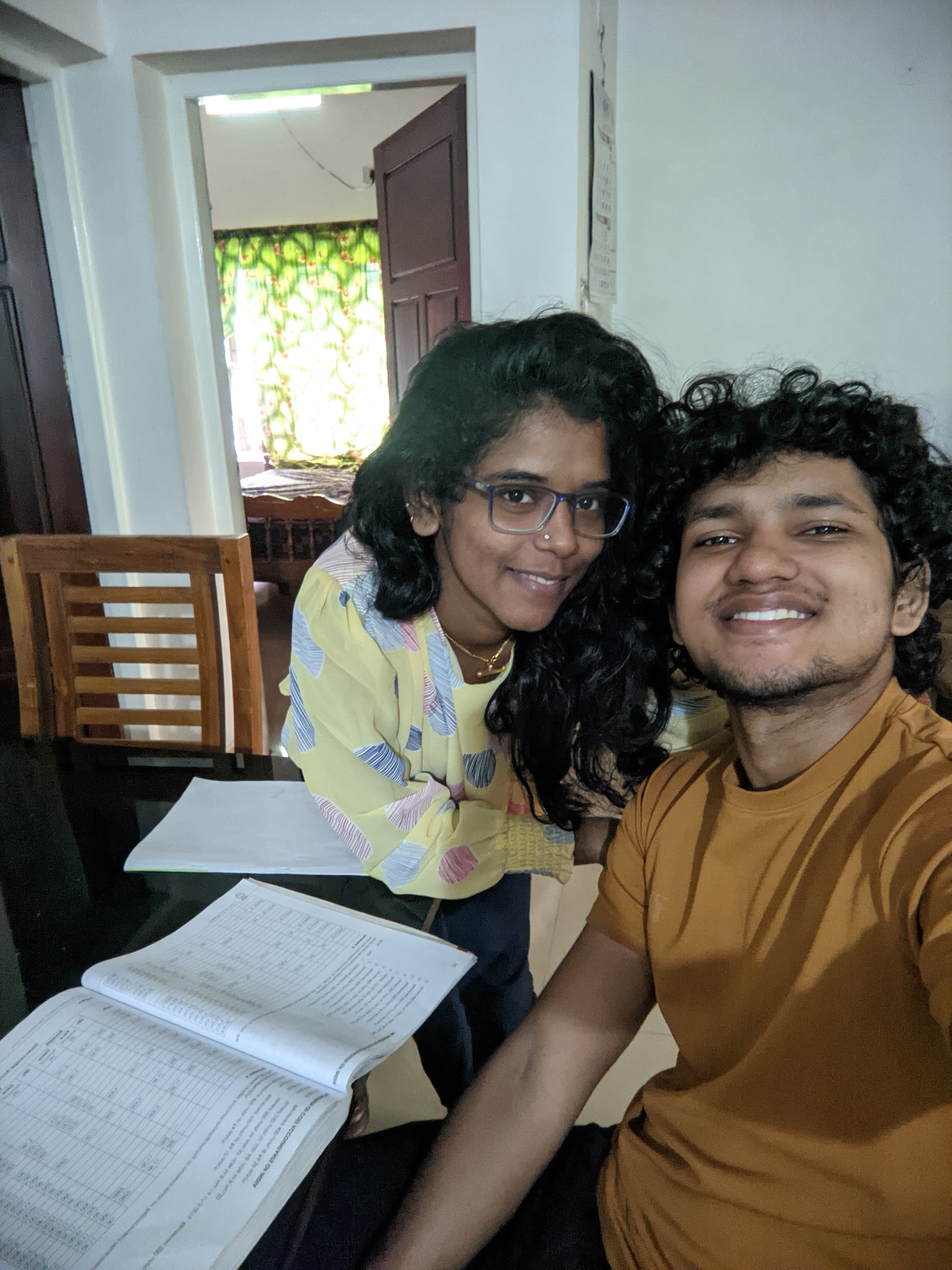 Indoor selfie with notebooks